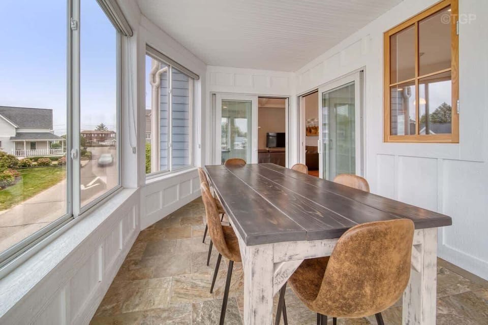 4 seasons porch with heated floors and harbor views 