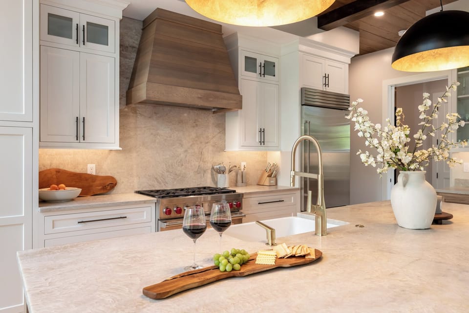 Elegant kitchen with custom cabinetry, high-end appliances, and a spacious island. Perfect for cooking and entertaining, complete with stylish finishes and plenty of space to gather.