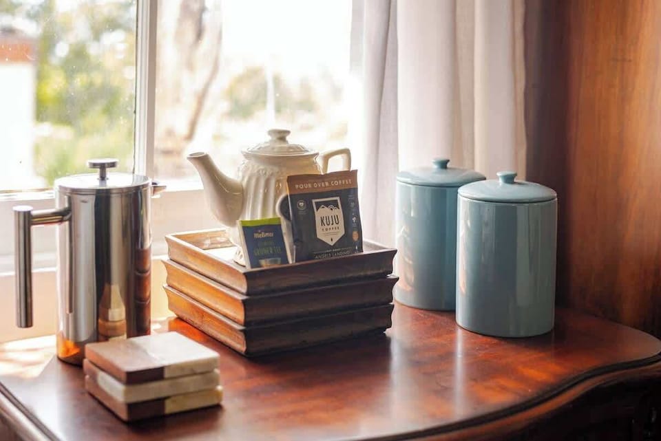 Stylish tabletop with tea essentials and décor, adding a warm and welcoming touch.