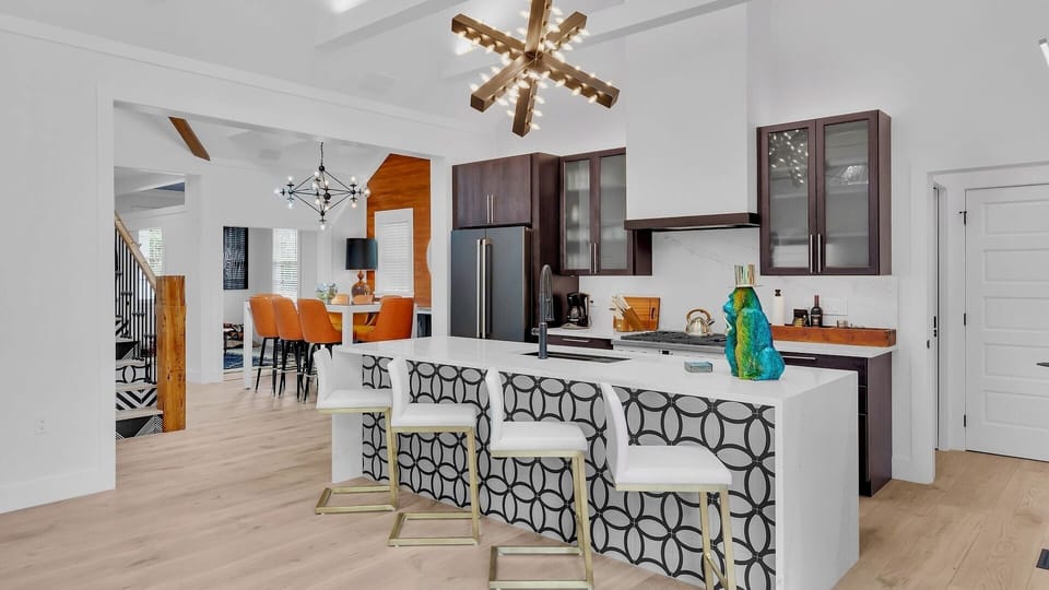 The open floor plan and high ceilings make the rooms feel even larger than they are...