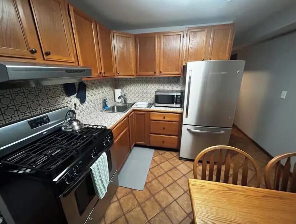 Fully equipped kitchen with coffee gear and all essentials.