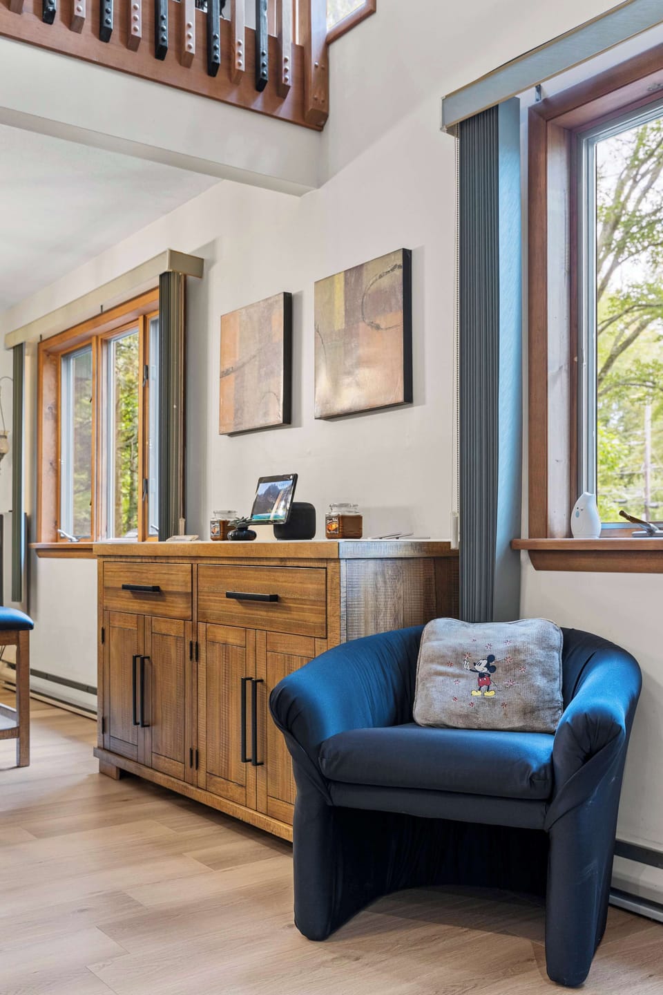 Claim a quiet moment. Sunlit chair and console, morning coffee spot before exploring The Hideout amenities and nearby Lake Wallenpaupack.