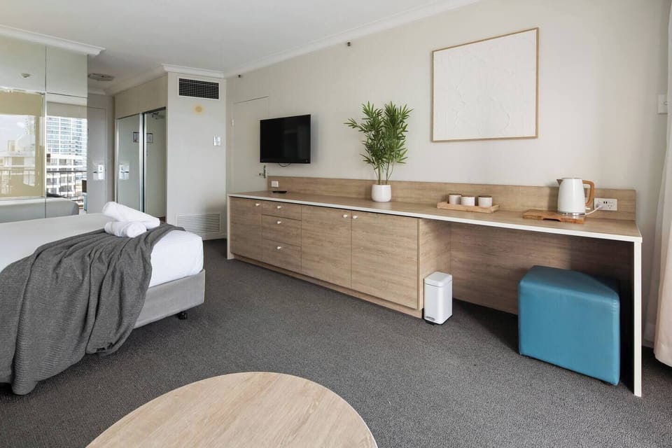 Unwind with Netflix on the flat-screen TV and enjoy light bites or a warm cuppa from the timber mini-bar, fully stocked with dishware, a kettle, and essentials.