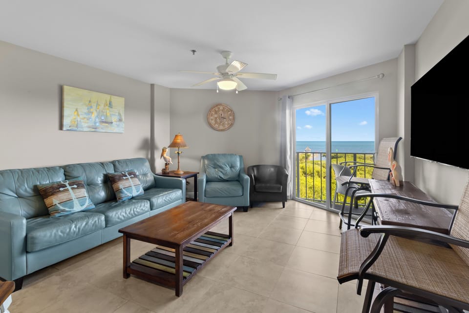 Lounge by the sliders and savor calming ocean views.