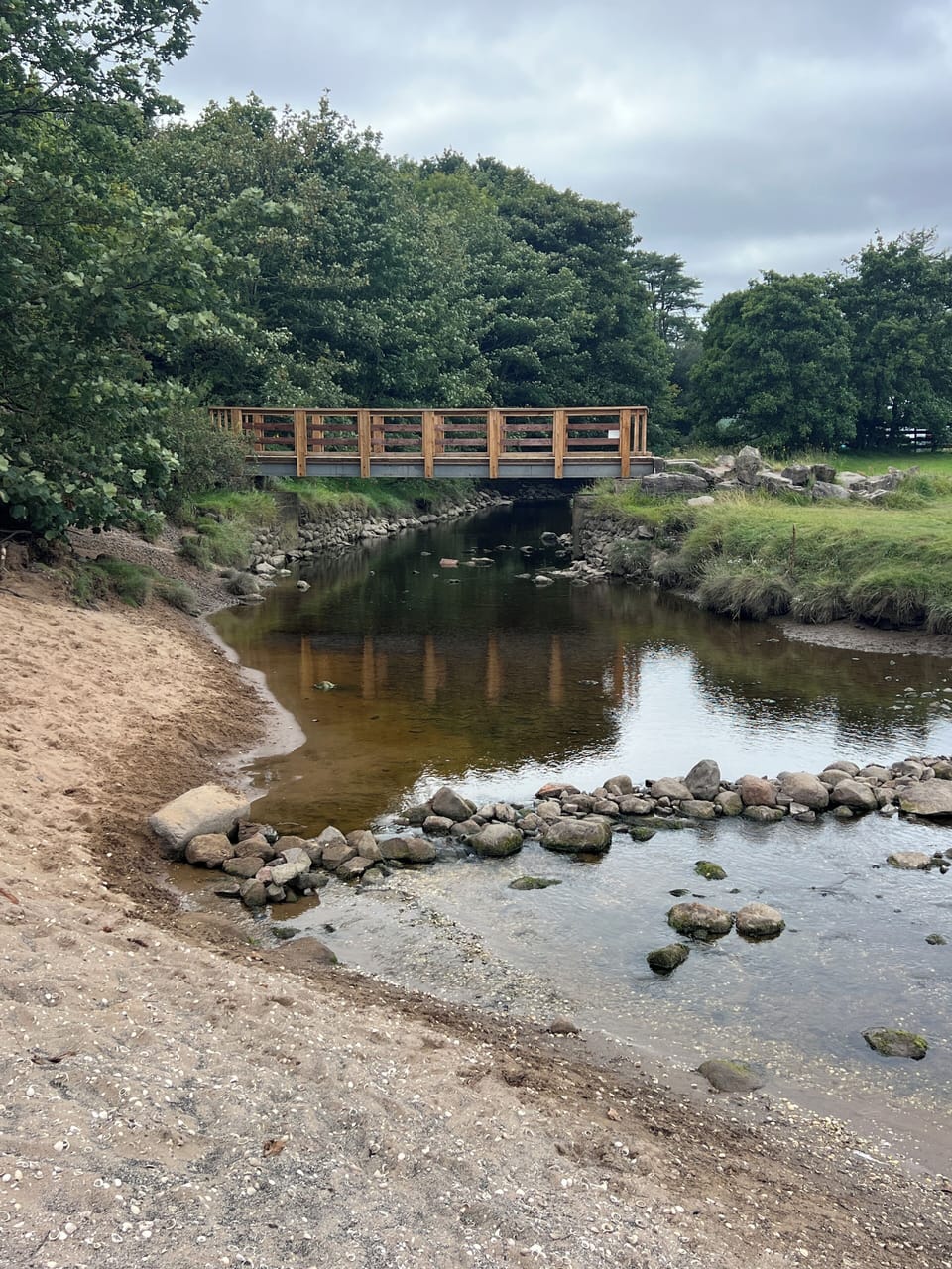 Crossing the burn at Sandyhills beach