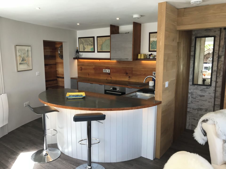 Kitchen and entrance to the main bedroom on the lower floor