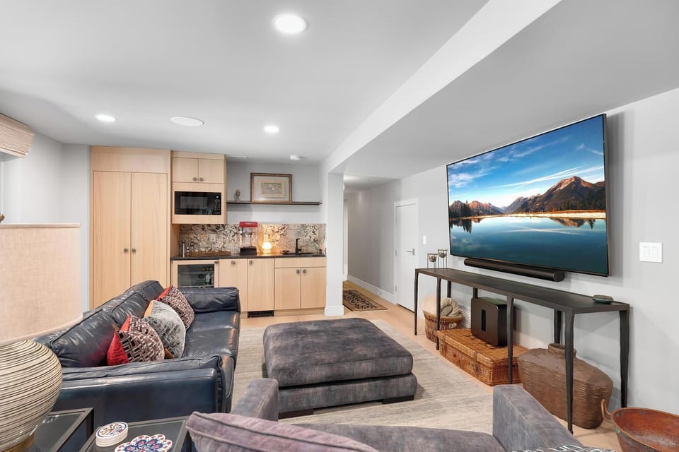 Main living area and wet bar of the private rentable space.