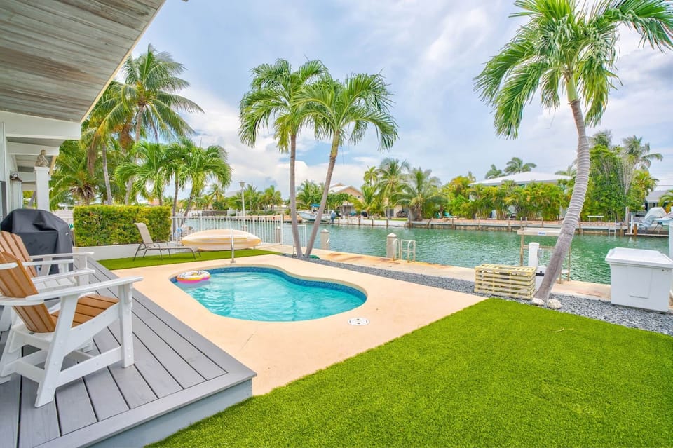 Lounge area, bbq, pool and dock