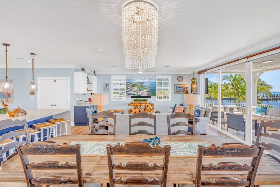 Gather for meals with a view in this elegant dining area, seating 8, featuring panoramic Gulf views that make every meal a memorable experience.