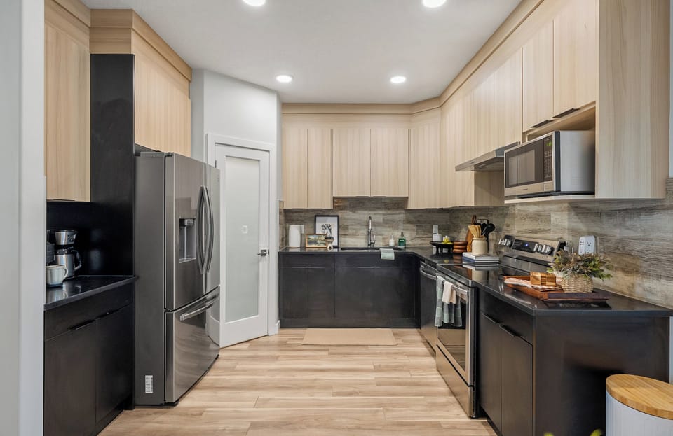 Chef-ready kitchen with premium appliances and calm modern design.