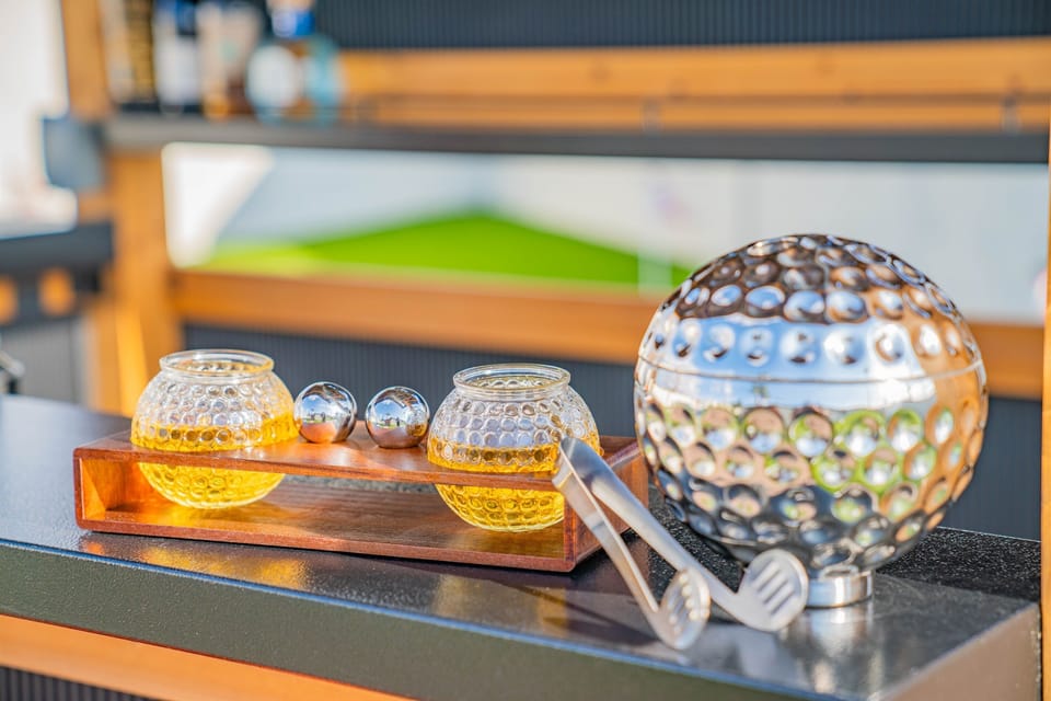 Golden hour cocktails and yard games, this outdoor bar setup is ready for happy hour with friends.