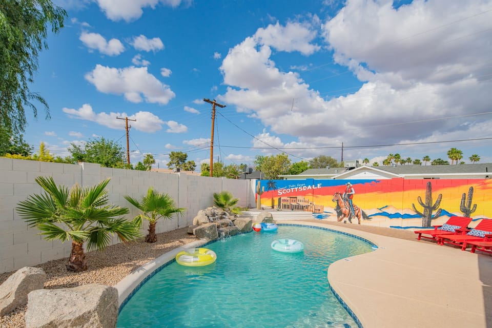 Make a splash in your private heated pool under the Arizona sun. Surrounded by desert landscaping and a vibrant Scottsdale mural, this oasis sets the stage for unforgettable days.