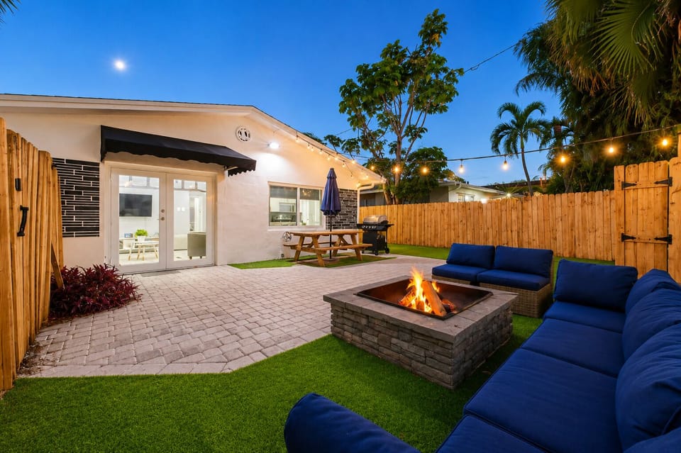 The paradise collection south florida unit 1400 backyard twilight fire pit lounge