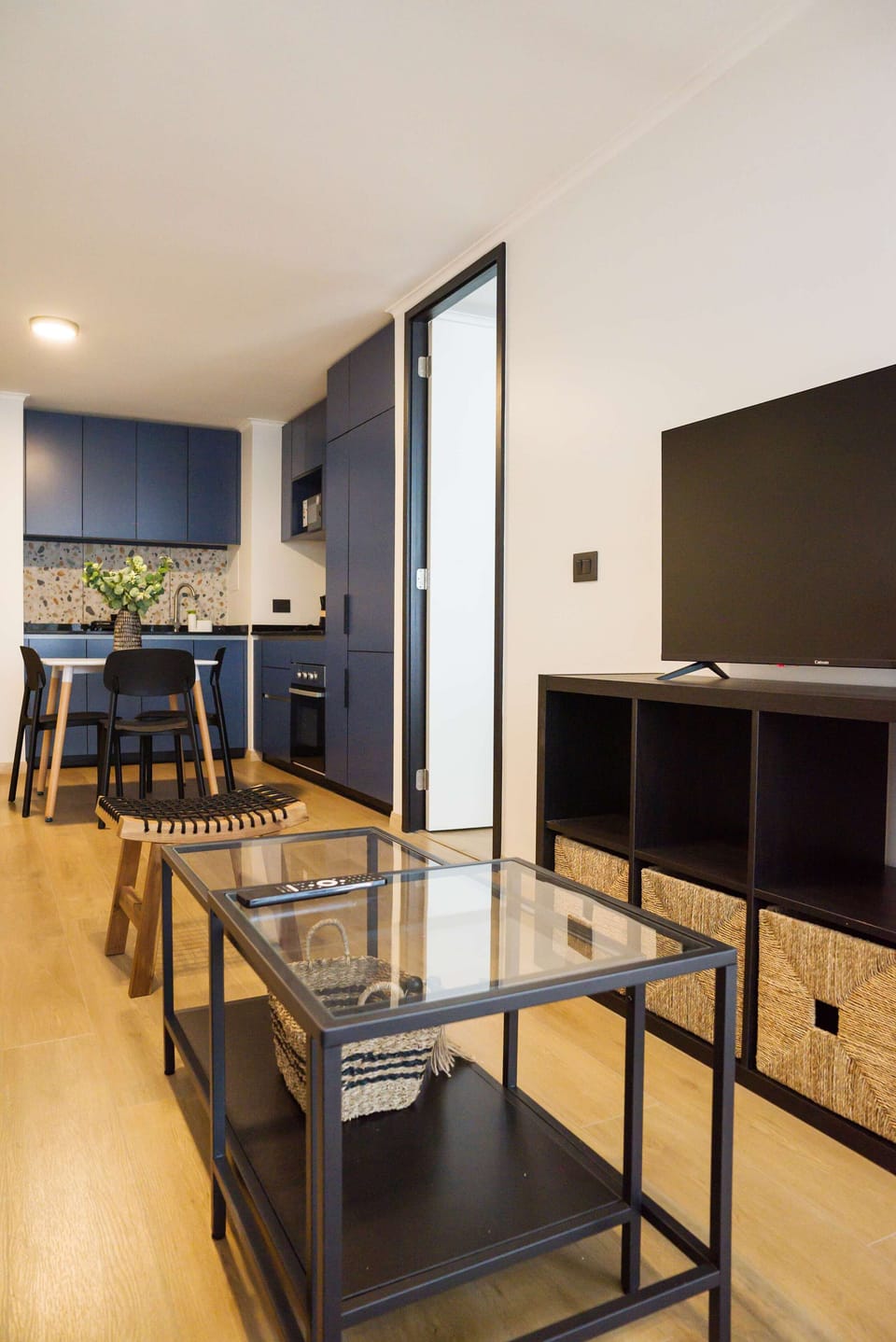 Modern studio with sleek kitchen and cozy living area, ideal for relaxation after exploring the city.