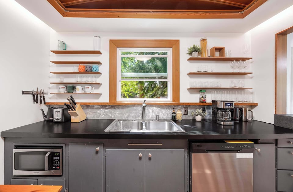 Everything you need for your stay, including microwave, coffee maker, and dishwasher.