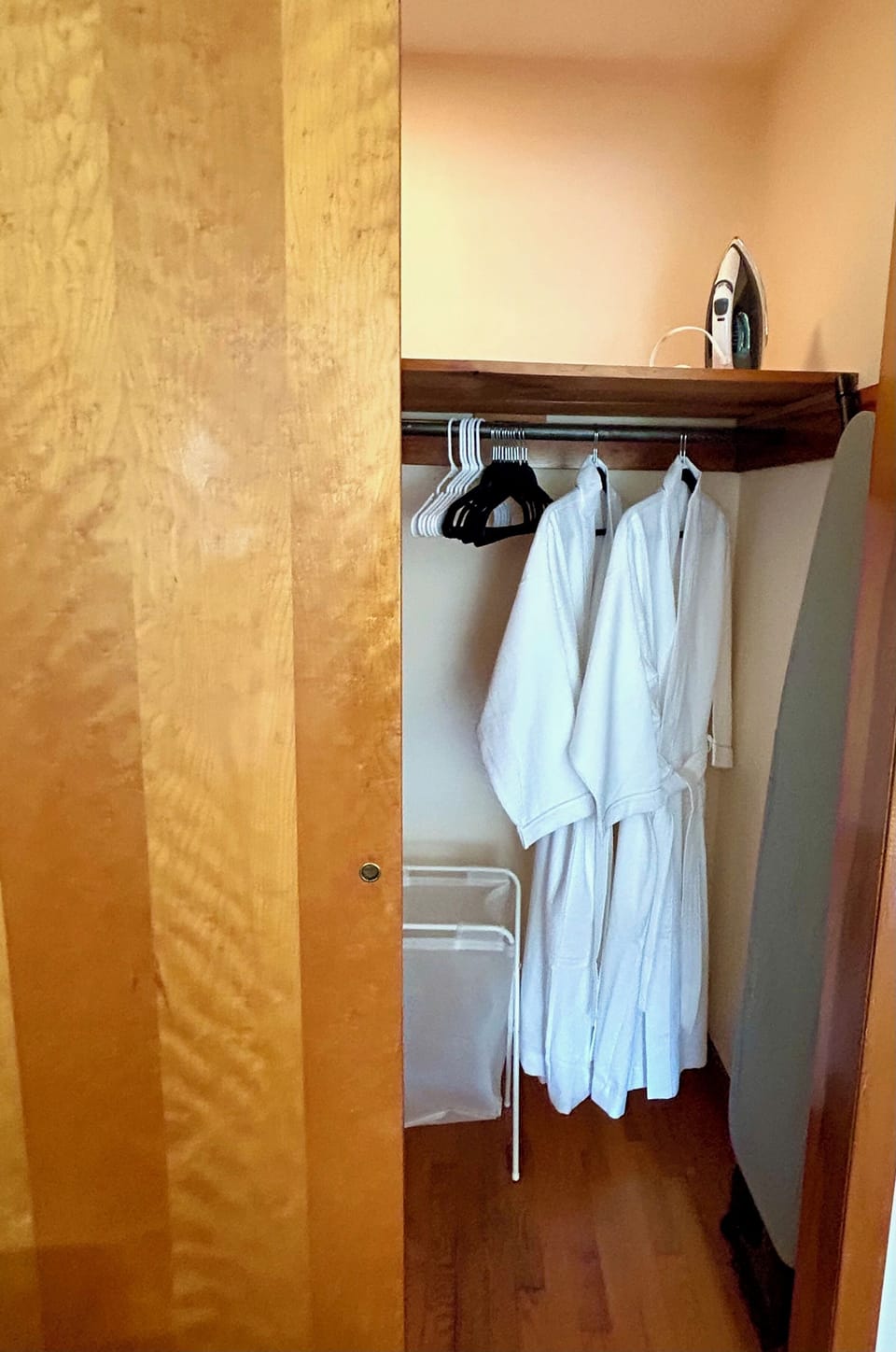 Robes, iron and ironing board provided
