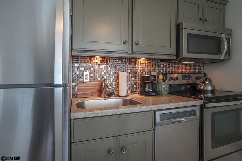 Custom cabinets and brand new appliances, including that oh-so-important dishwasher