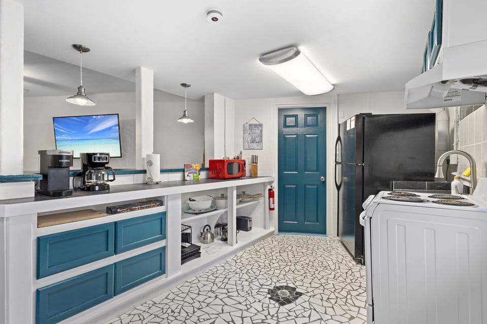 Fully equipped kitchen with everything you need to prepare delicious meals during your beach getaway.
