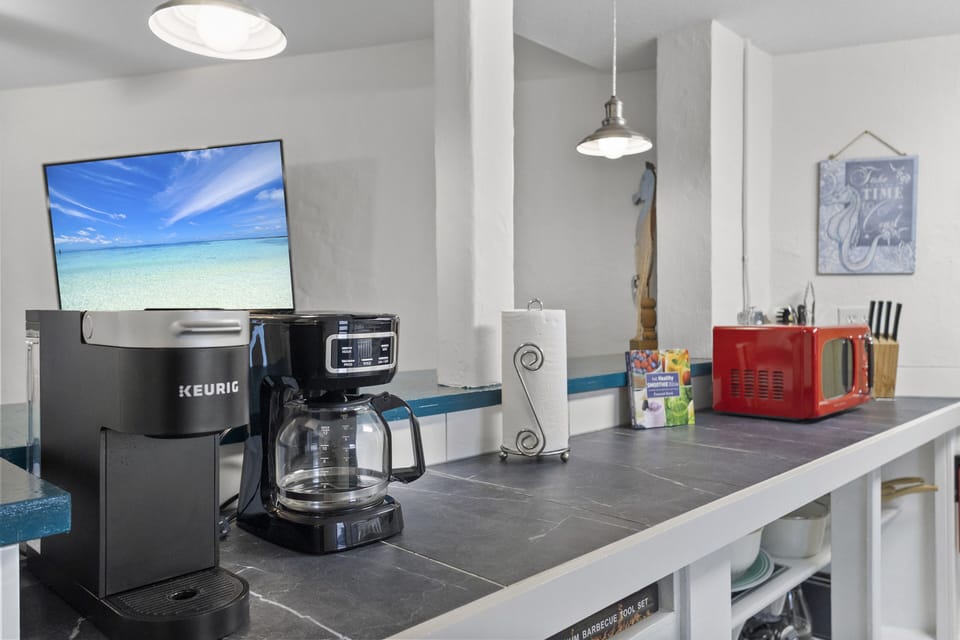 Well-stocked kitchen with all the cookware, utensils, and essentials to make dining in easy and enjoyable.
