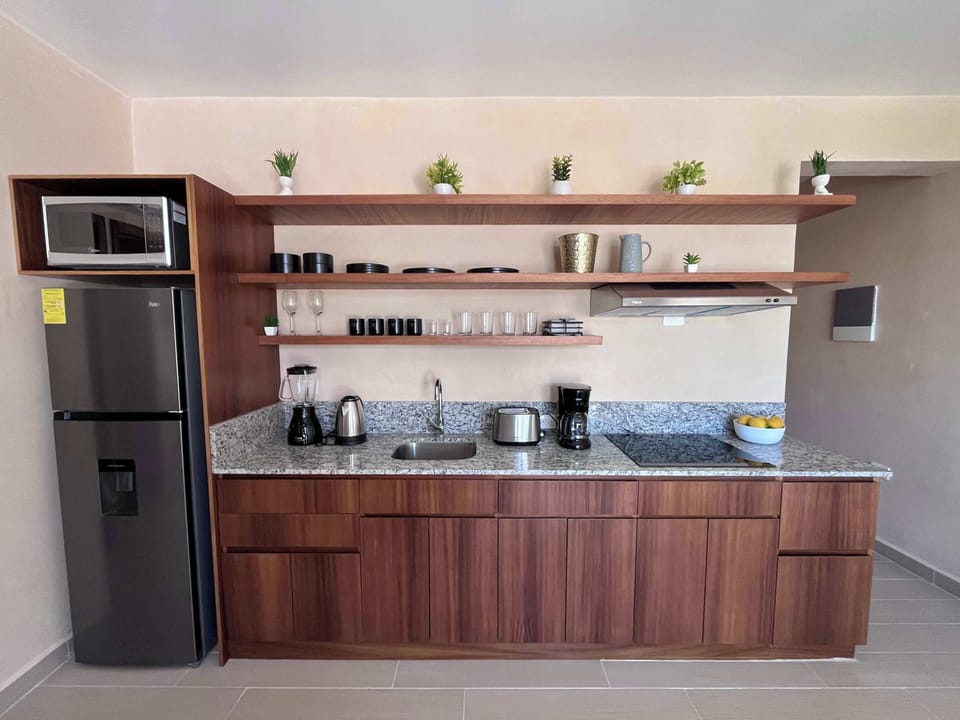 Whip up delicious meals in your full kitchen, complete with modern appliances.