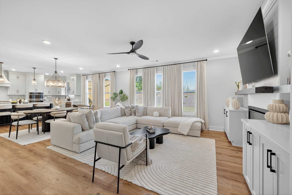 Curl up in the chic living room & stream your favorites on the smart TV​