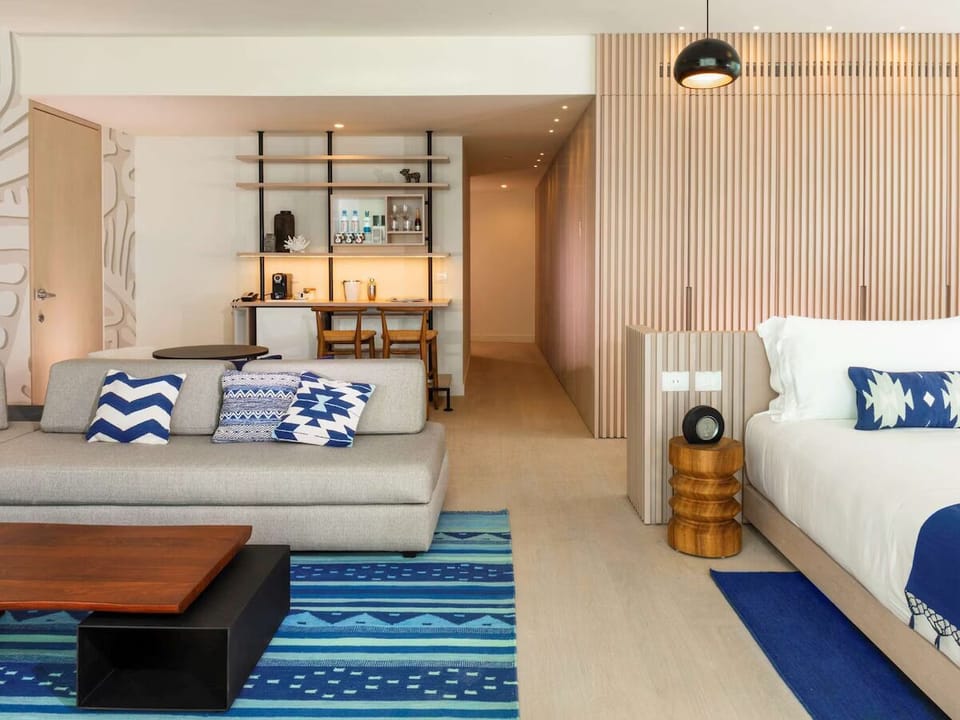 Gather for drinks at the in-room bar after beach days.