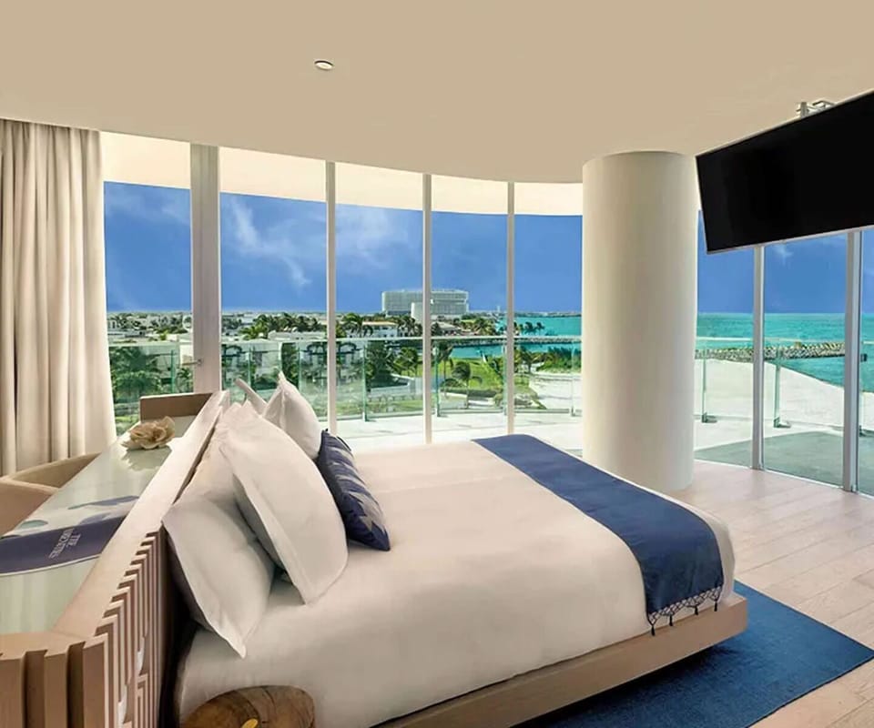 Stretch out in a sunlit suite with panoramic sea views.