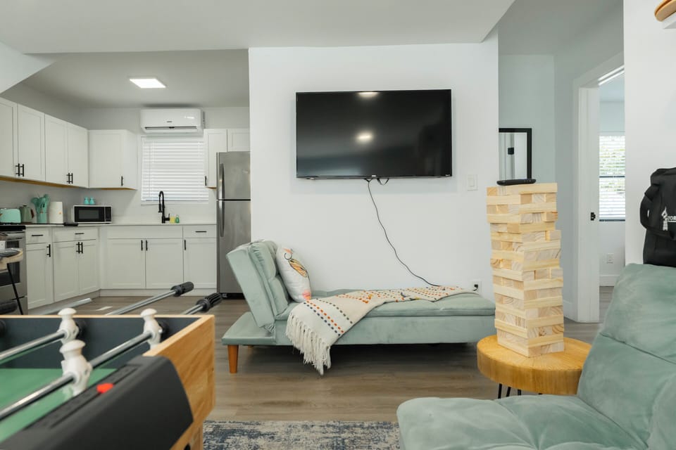 Movie nights made easy with a big screen and a cozy spot to stretch out.