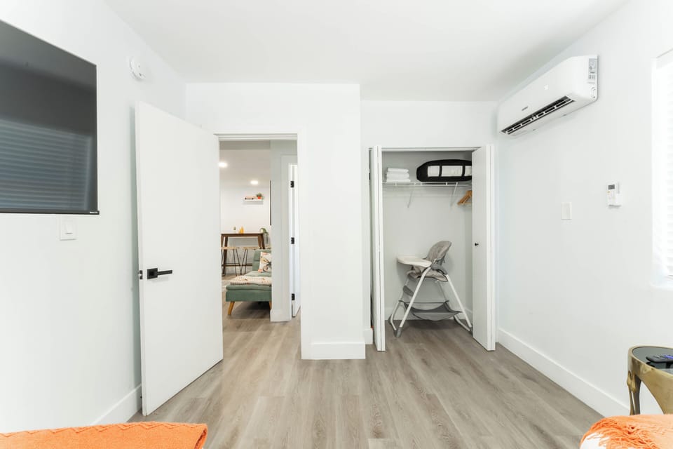 Spacious closet, TV, and cozy beds to unwind after a full day of fun.