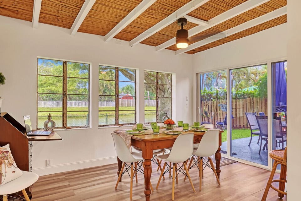 The dining area offers seating for six in a bright, inviting space, perfect for enjoying home-cooked meals or takeout from nearby restaurants. Corner fold out desk for those remote workers