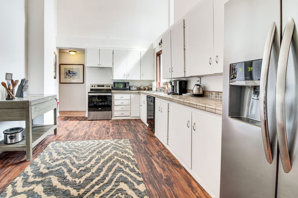 Kitchen | In-Unit Laundry | Central Heating & A/C