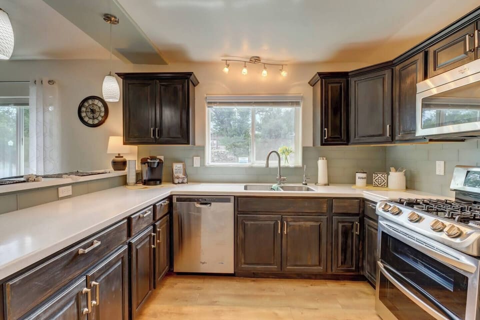 Full kitchen GAS stove, dishwasher, microwave, double sink