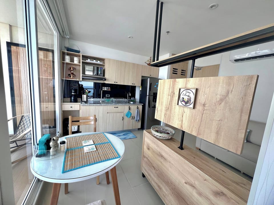 Dining area space with thoughtful details seamlessly integrated with the kitchen