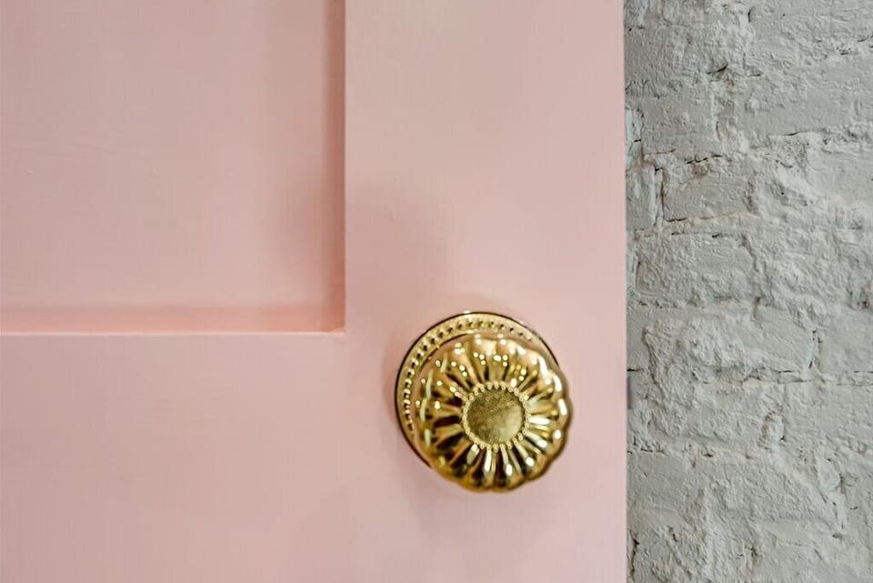 Charming details abound, including playful, unique doorknobs.