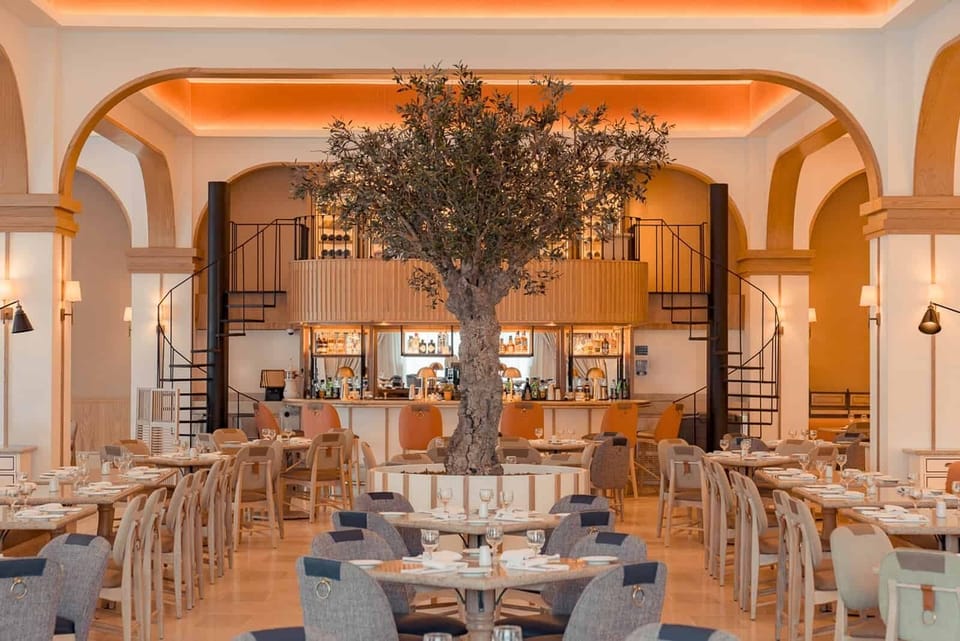 Start the day in a sunlit dining room with resort views.