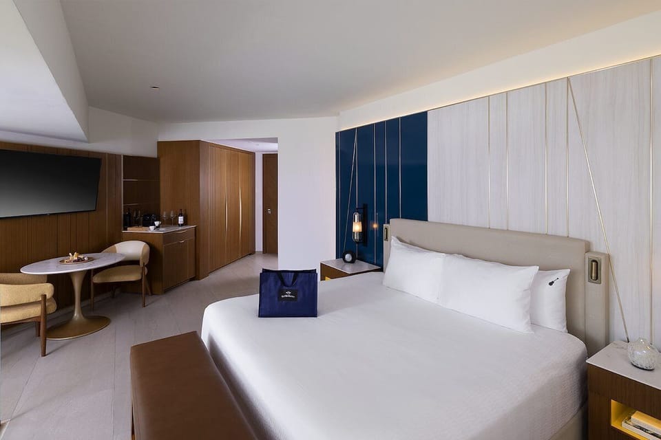 Unwind in a spacious suite with cozy seating nook.