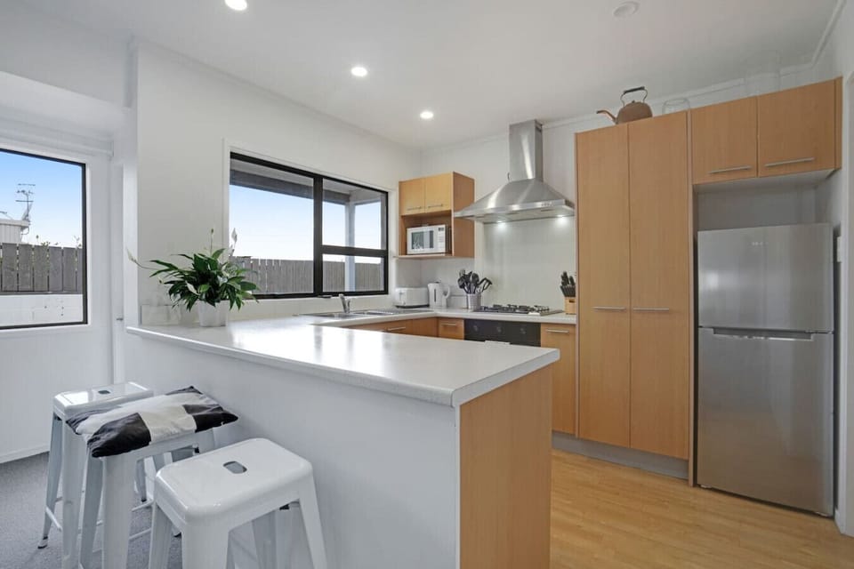 There is breakfast bar seating for those casual meals or for children to do homework.