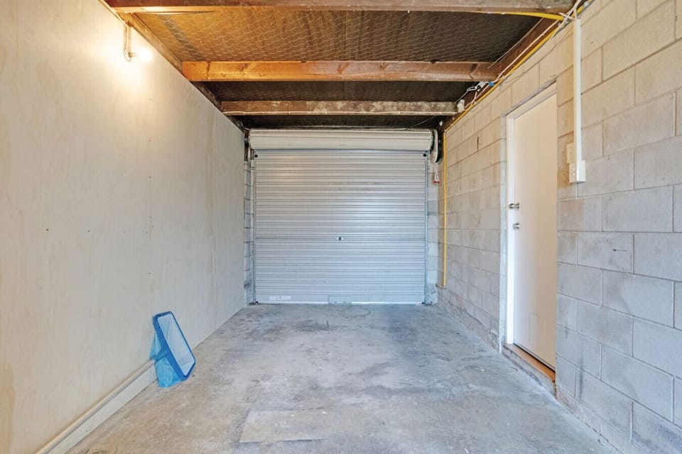 The garage will easily accommodate one small vehicle.