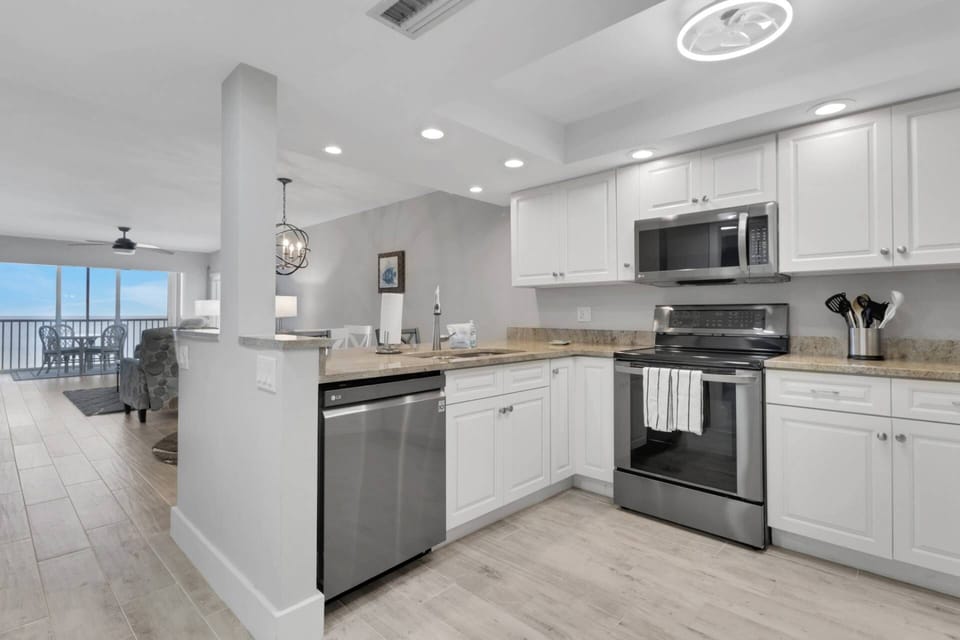 The open kitchen allows conversation to flow freely throughout the kitchen and main living space.