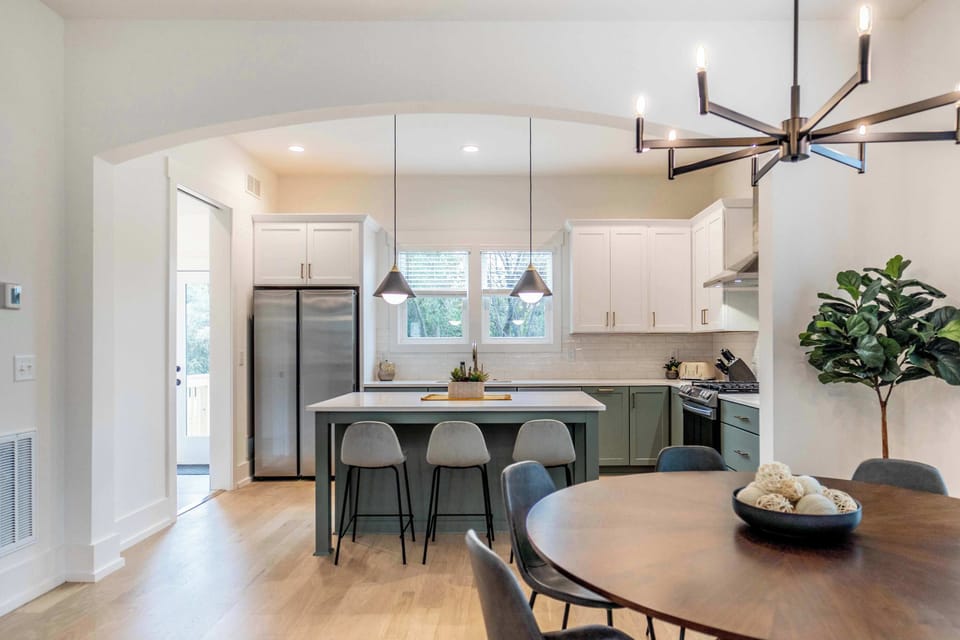 Enjoy cooking in the spacious kitchen area complete with large kitchen island, stainless steel appliances and fully stocked with all cookware and utensils.