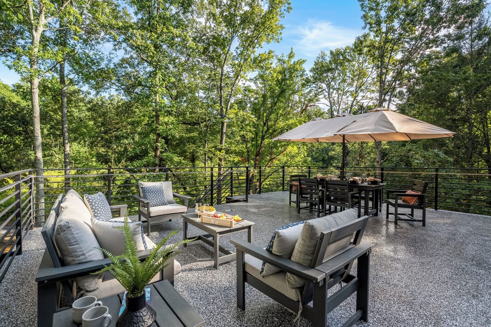 Rooftop dining with shade and lounge seating