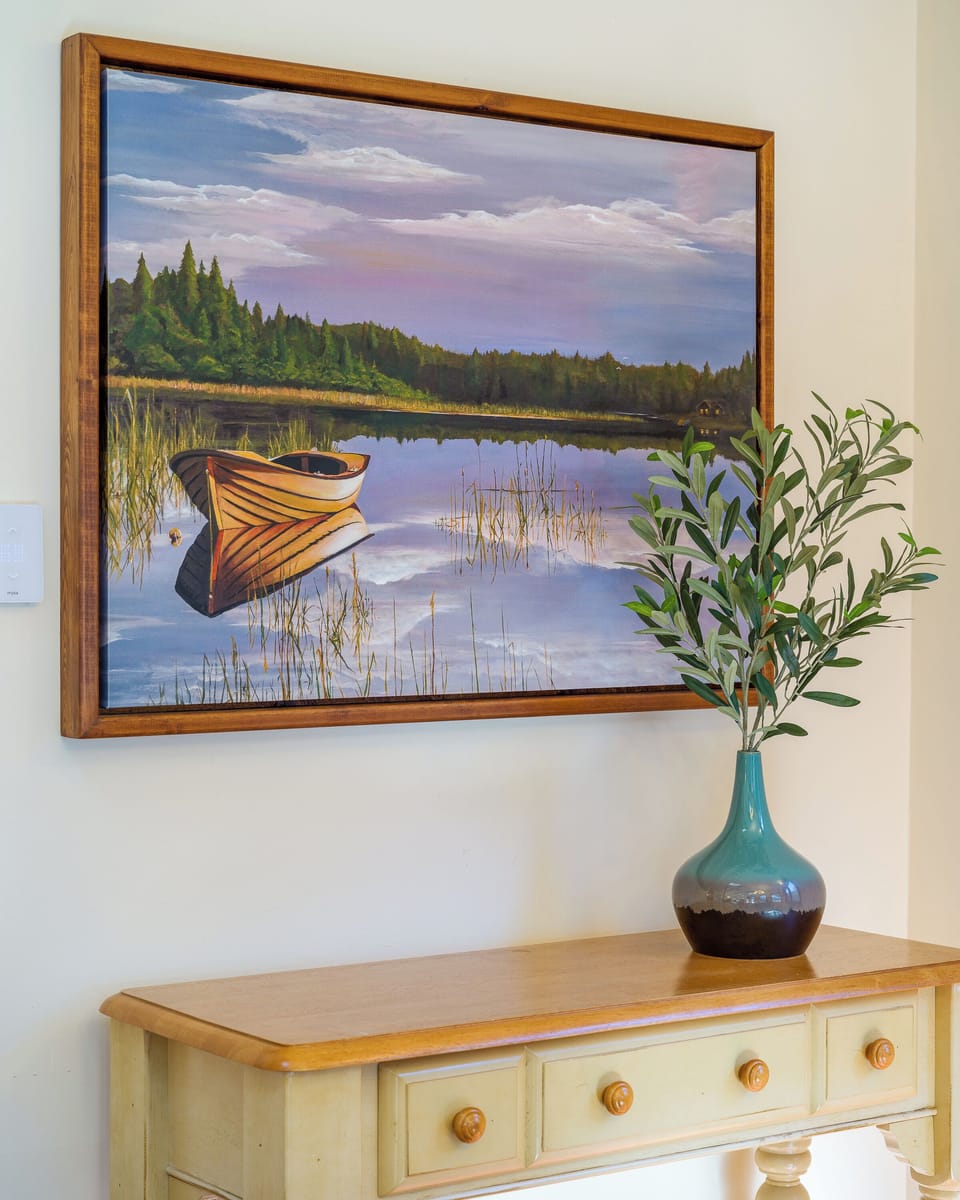 Original art and beautiful decor make this home special.