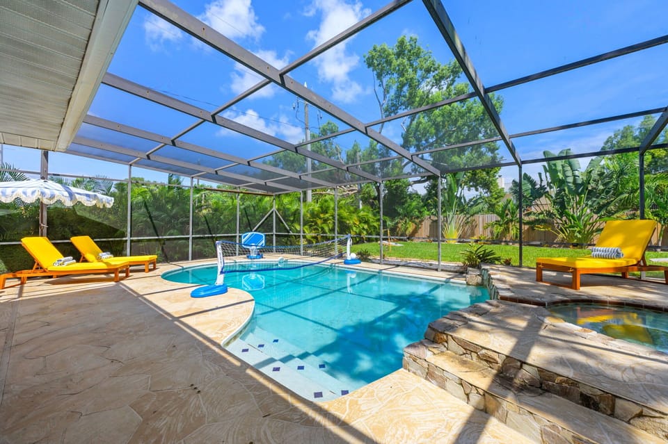 Paradise is Just a Few Steps Away! Imagine yourself here! Our incredible screened pool area is the perfect place to spend your days.  Your perfect vacation day starts (and ends!) here.
