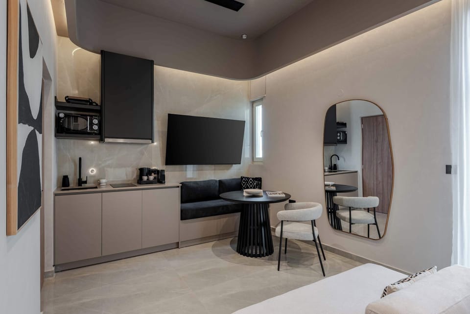 
Kitchenette with  Hobs, Microwave, Coffee Maker, Kettle, and Toaster