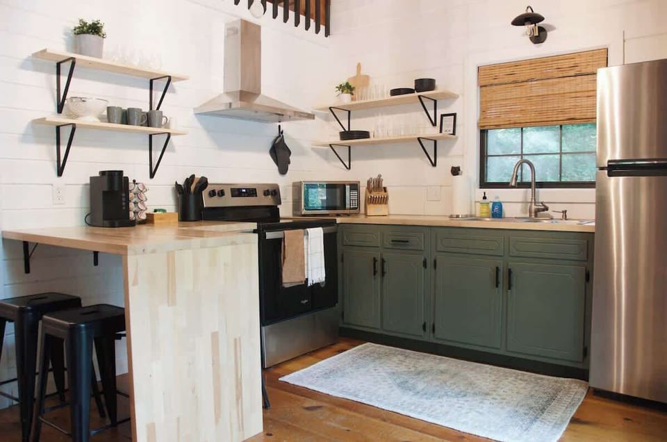 Fully Stocked kitchen in case you don’t feel like going into the nearby downtown. Sit at the countertop or eat dinner on one of the two outdoor patios. 