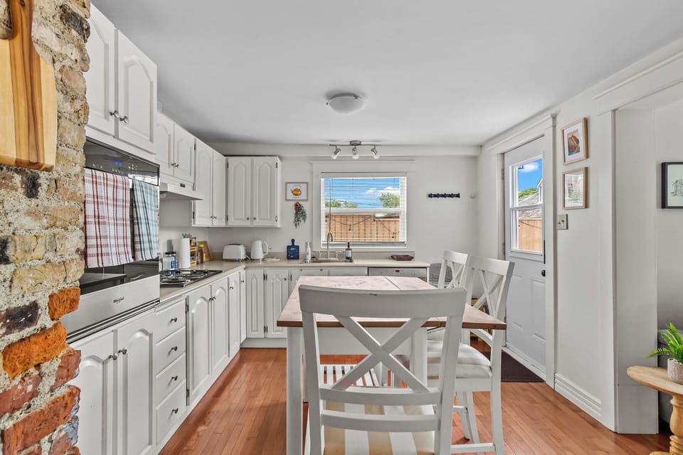 White cabinetry & full cooking essentials