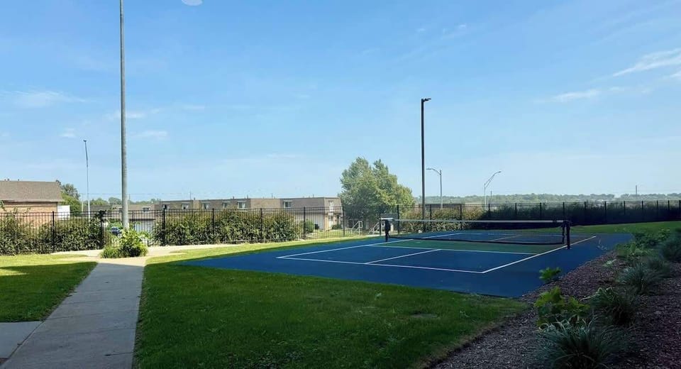 Game time! Enjoy lively court play and soak up the sun.
