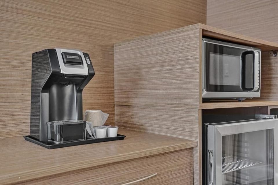 Start mornings right with fresh coffee steps from bed.