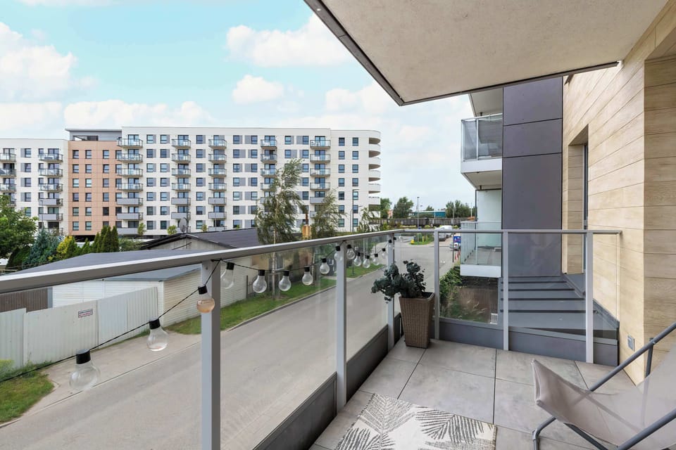The balcony provides a perfect spot for enjoying the fresh air.