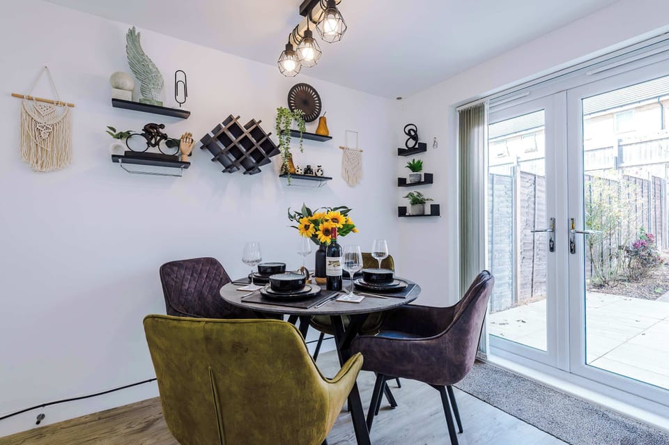 The bright and spacious kitchen has everything you could possibly need to cook during your stay. To name a few, there is a microwave, toaster, kettle, oven and washing machine plus a dining area that seats 4.